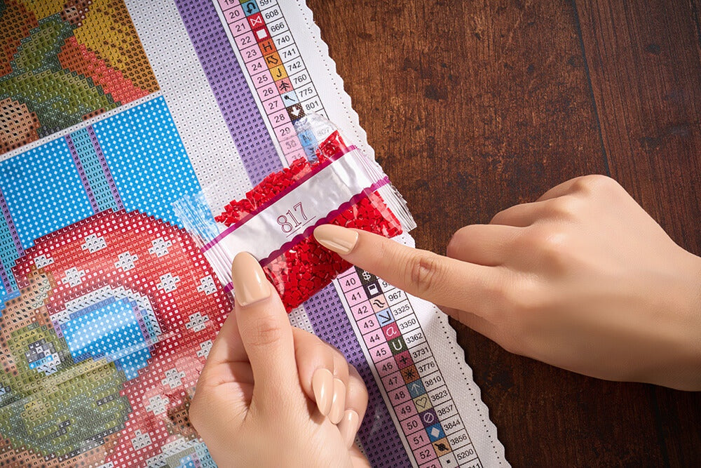 Matching a numbered diamond bag with the code on the canvas chart.