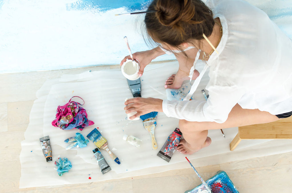 aerial view woman painting