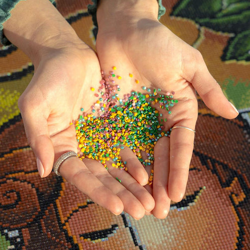 hands holding diamond drills