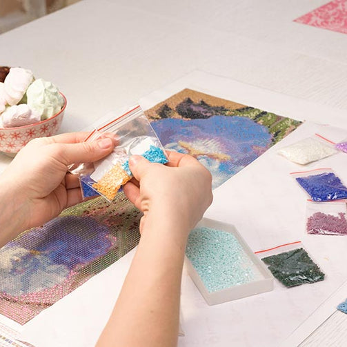 working on diamond art painting