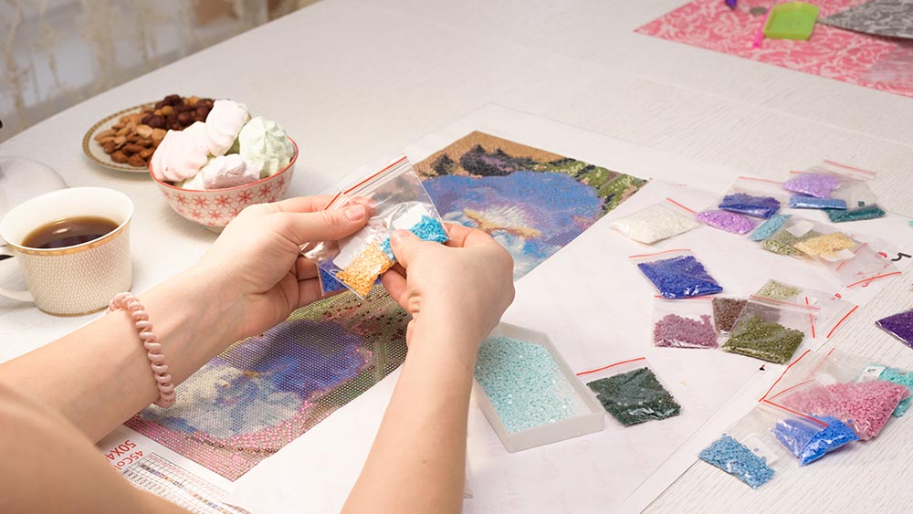working on diamond art painting