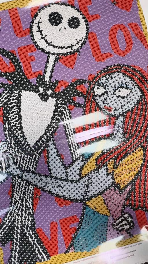 Jack and Sally on the freshly unrolled Undying Love canvas