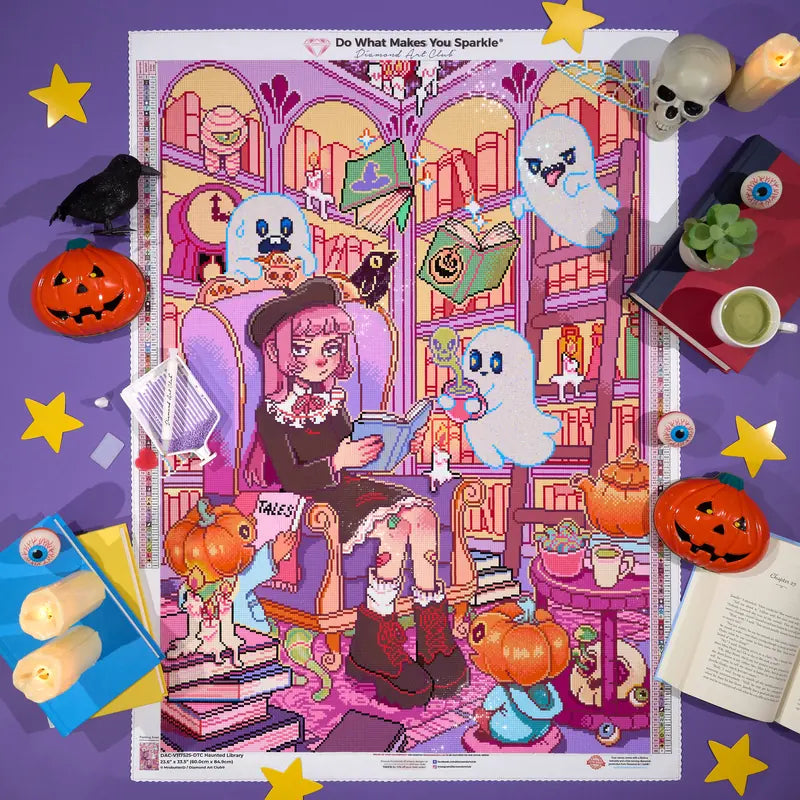 Finished Haunted Library diamond painting with friendly ghosts, pumpkins and books, styled with Halloween decorations.