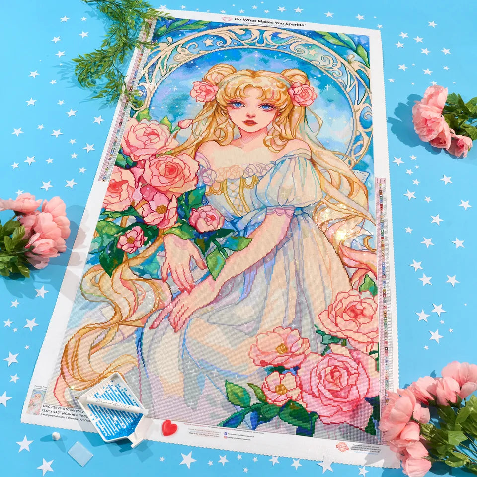 Serenity, completed diamond painting. Pink flowers, foliage, stars, and diamond-painting tools.